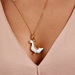 Necklace Goose featuring a playful gold-plated charm with glossy enamel finish worn on a delicate chain.
