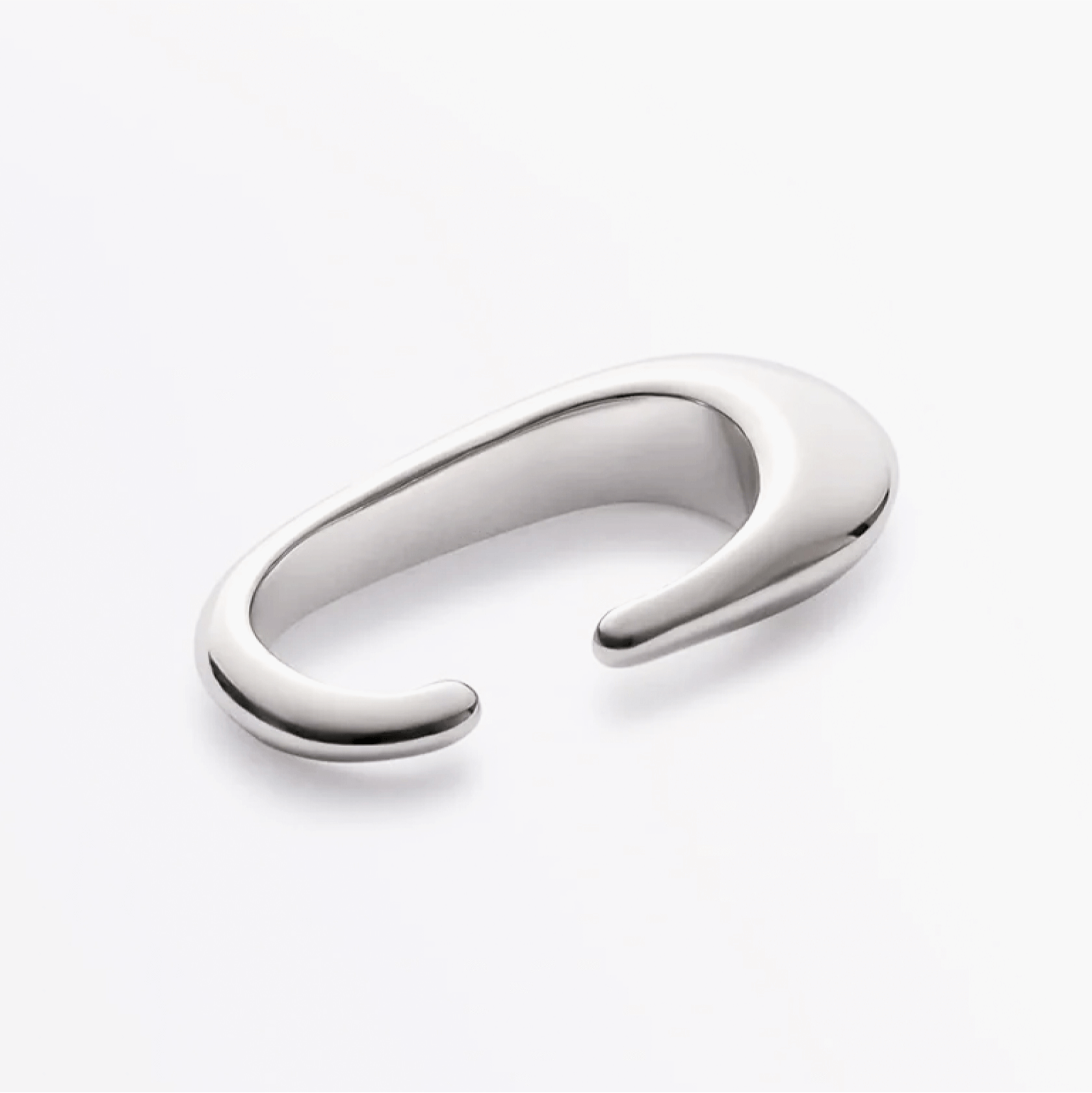 Earcuff Clip made of brass with a polished finish, showcasing minimalist design and fluid strength.
