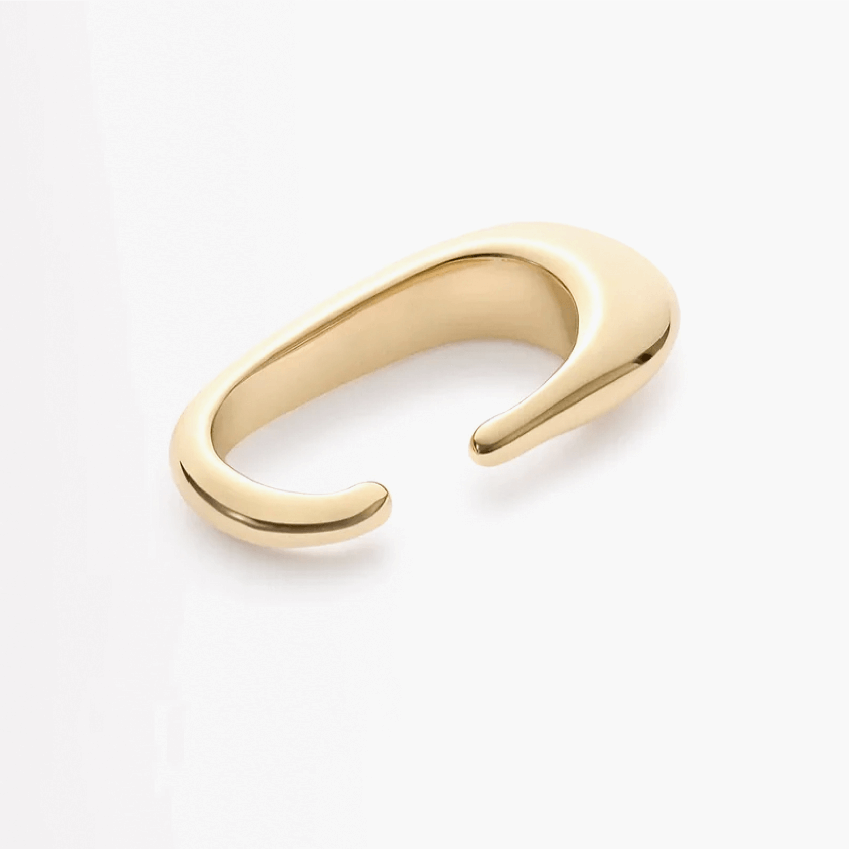 Earcuff Clip, a gold brass sculptural ear clasp showcasing minimalist design and polished finish.