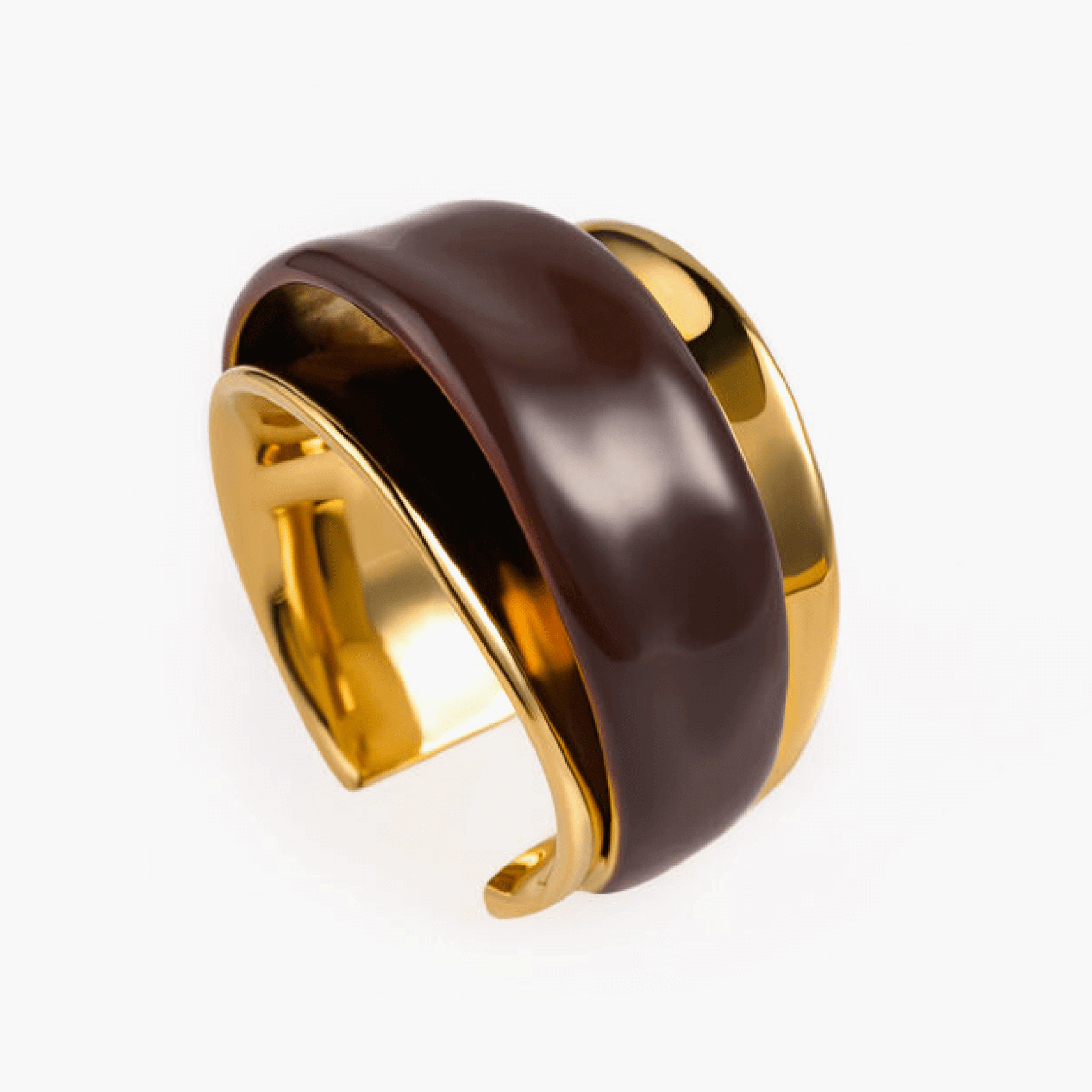 Ring Terra in brass with gold-plated finish and warm brown enamel drip glaze, showcasing elegant design.