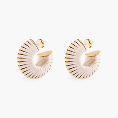 Earrings Arc featuring textured faux leather and 18k gold plating, showcasing a modern design inspired by nature.
