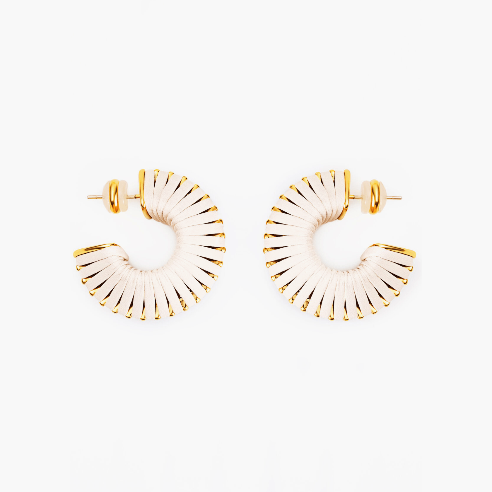 Earrings Arc featuring textured brass and 18k gold plating with faux leather accents, inspired by nature.
