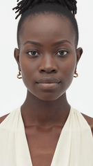 Earrings Sway worn by a model, showcasing the gold-plated brass and elegant design with fluid motion.