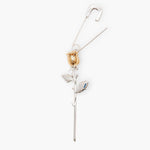 Earrings Bloom featuring a gold-plated rose and sleek safety pin design, symbolizing beauty and resilience.