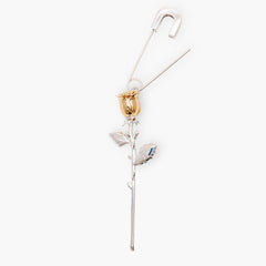 Earrings Bloom featuring a gold-plated rose and sleek safety pin design, symbolizing beauty and resilience.