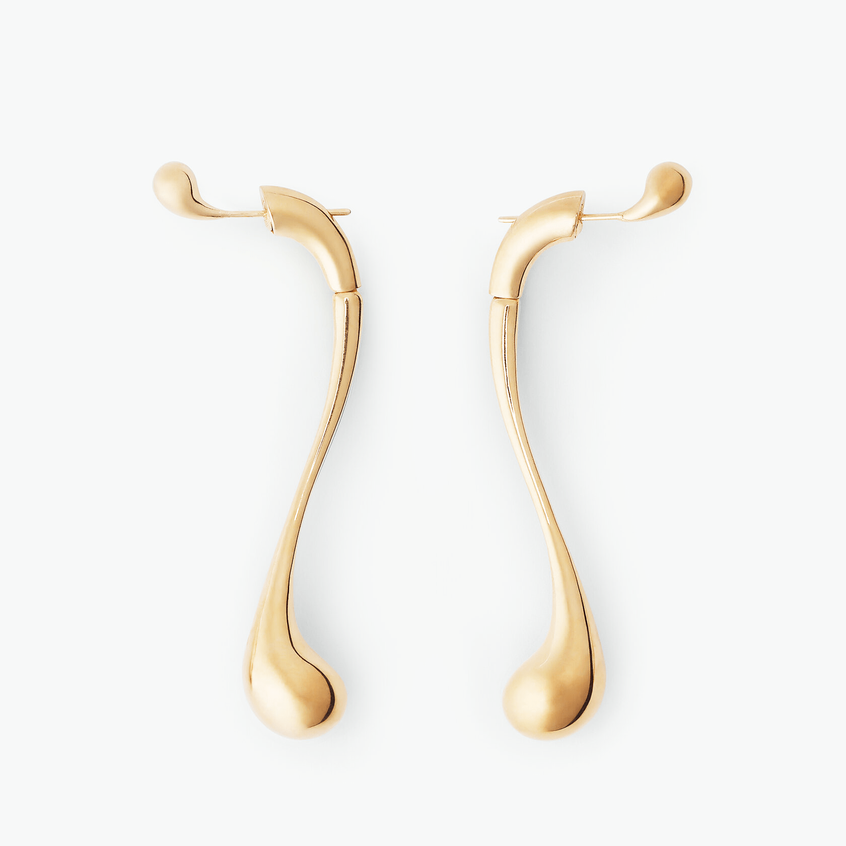 Earrings Drip in gold-plated brass, featuring an elegant elongated droplet design that reflects modern artistry.