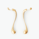 Earrings Drip in gold-plated brass, featuring an elegant elongated droplet design that reflects modern artistry.
