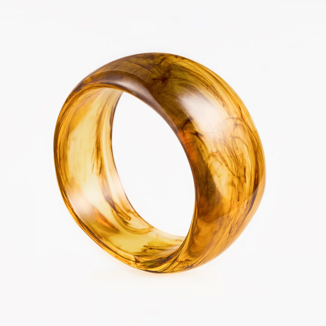 Bracelet Solar made of plastic with smooth golden amber hues, showcasing bold elegance and modern sophistication.